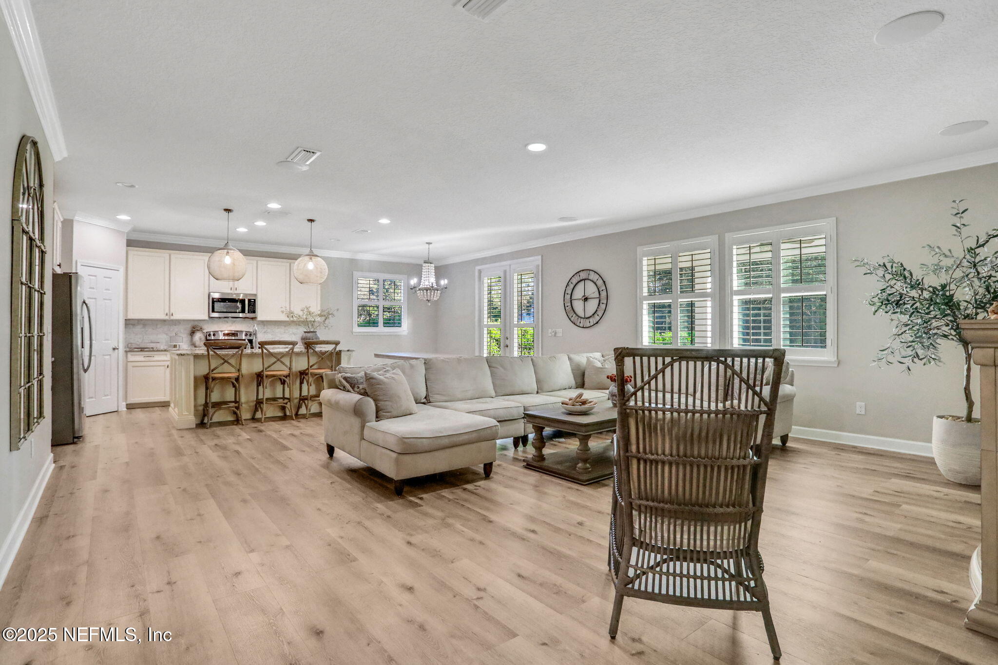 119 Duck Pond Drive St. Augustine, FL 32086 - Photo 9 of 56 a living room with furniture and a table