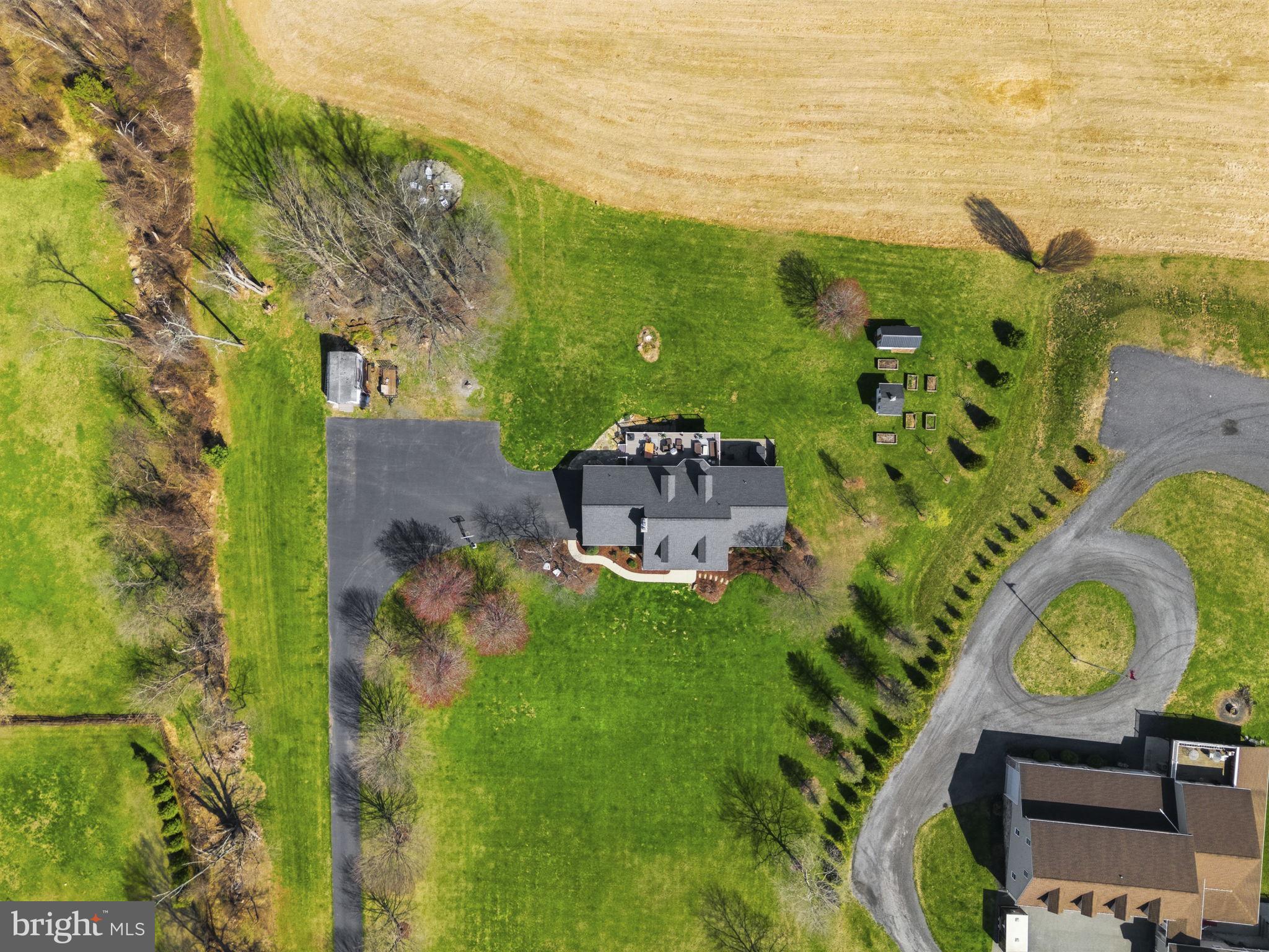 1100 Walters Mill Road Forest Hill, MD 21050 - Photo 13 of 18 a backyard of a house with table and chairs