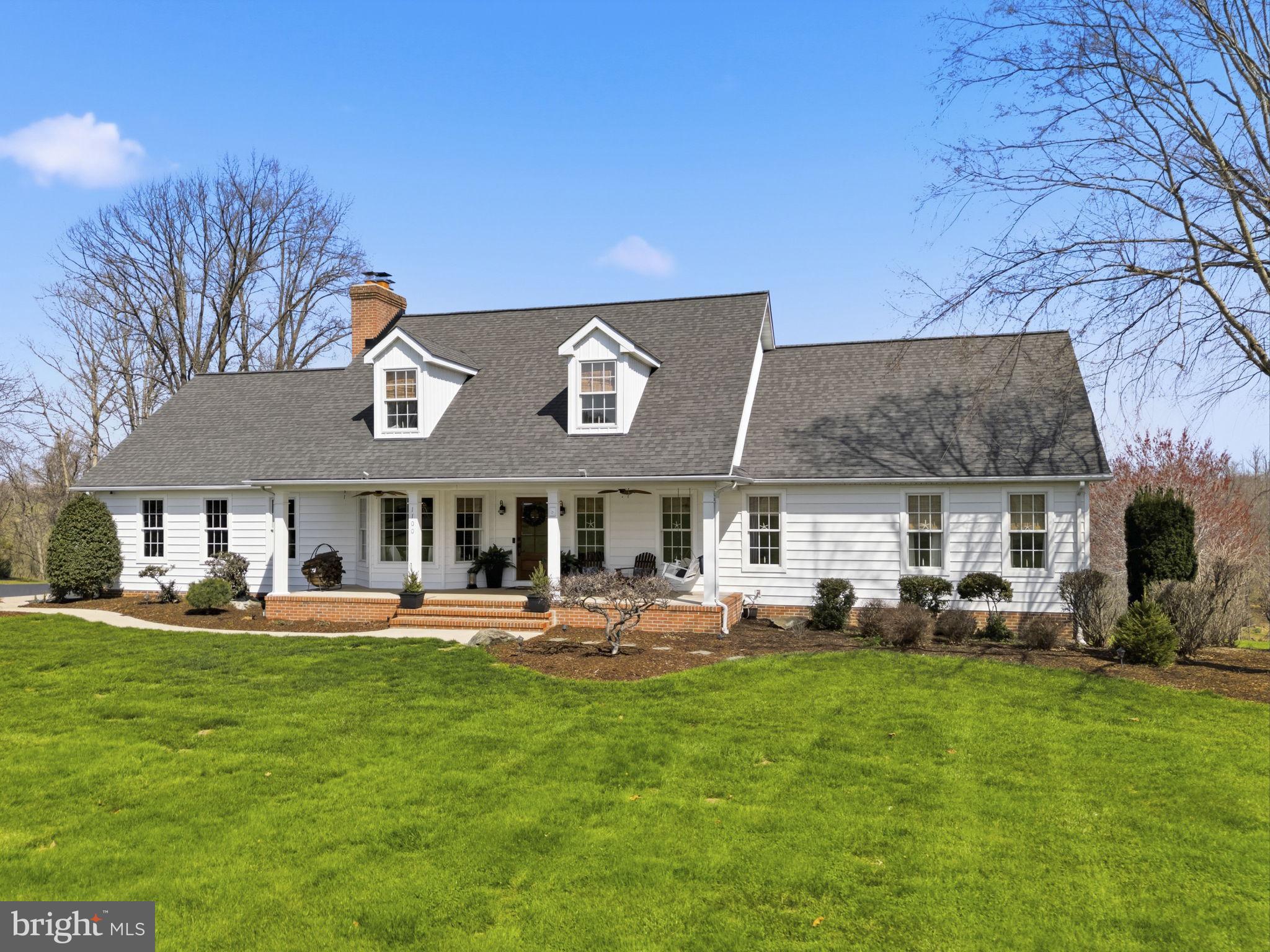 1100 Walters Mill Road Forest Hill, MD 21050 - Photo 5 of 18 a front view of a house with a yard patio and fire pit