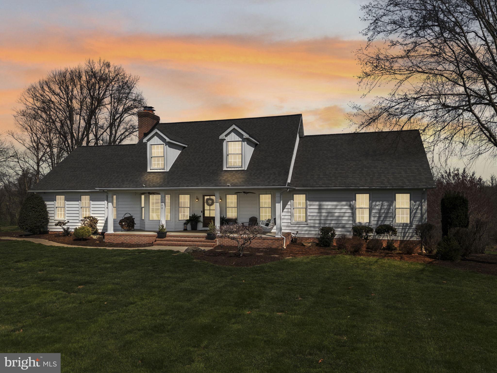 1100 Walters Mill Road Forest Hill, MD 21050 - Photo 6 of 18 a front view of a house with a garden