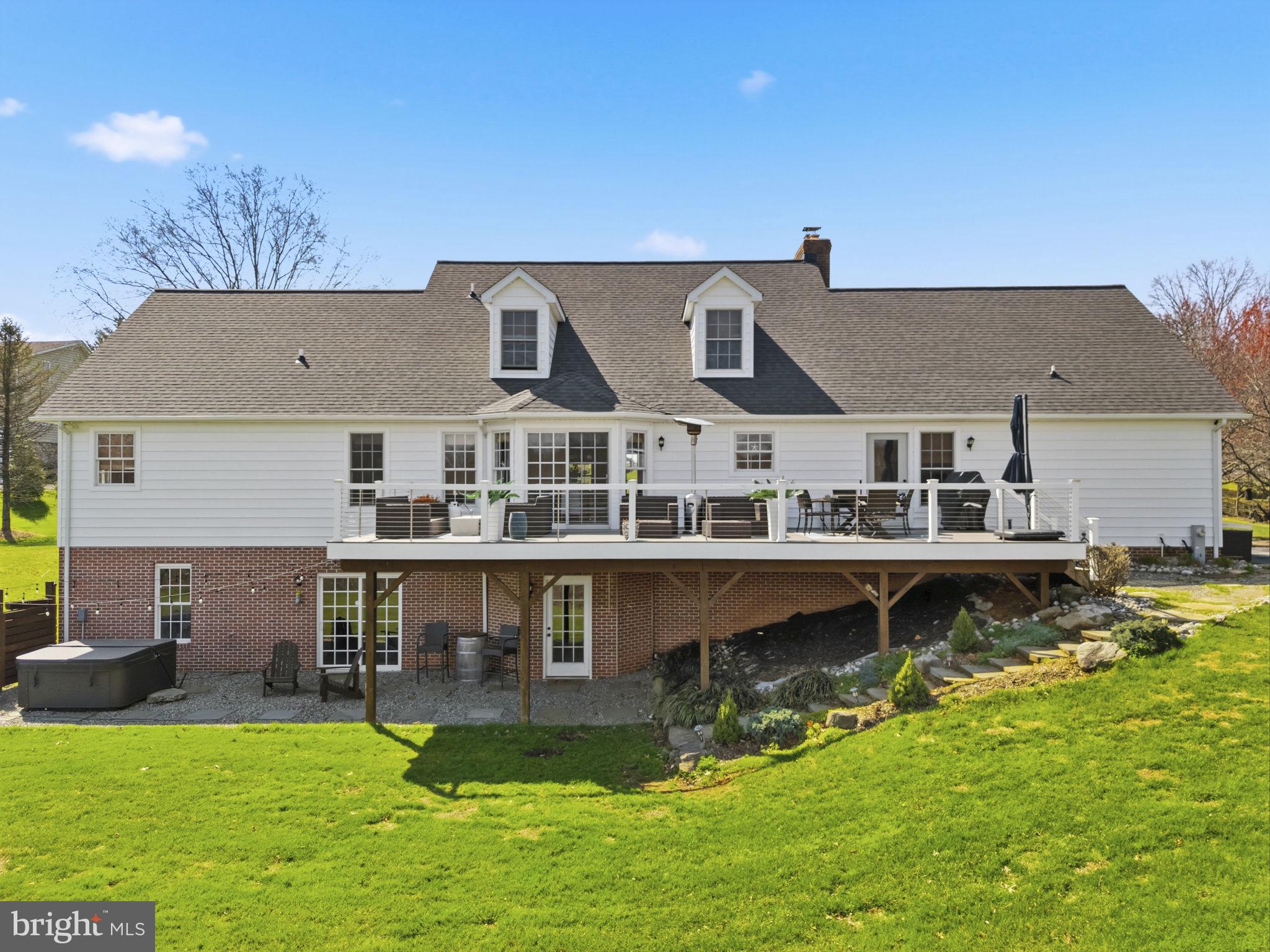 1100 Walters Mill Road Forest Hill, MD 21050 - Photo 8 of 18 a aerial view of a house with a yard table and chairs