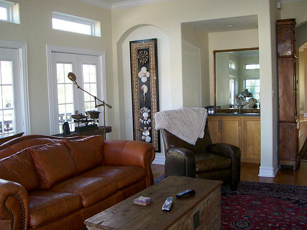 620 8th Street Kemah, TX 77565 - Photo 2 of 17 a living room with furniture and a large window