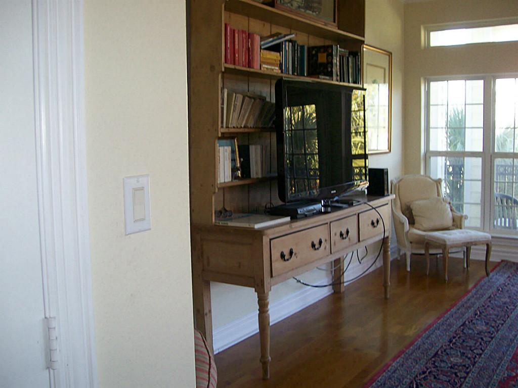 620 8th Street Kemah, TX 77565 - Photo 5 of 17 a living room with furniture and a flat screen tv