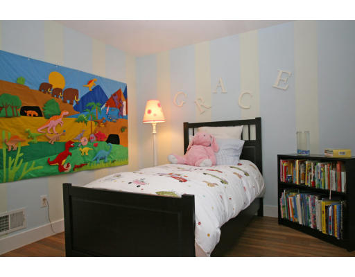 9 Pilgrim Road Hamilton, MA 01982 - Photo 22 of 26 a bedroom with a bed painting on wall and a potted plant