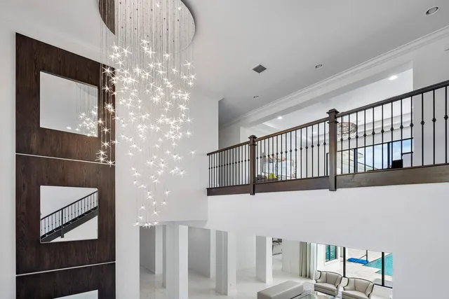 a kitchen with a sink window and cabinets