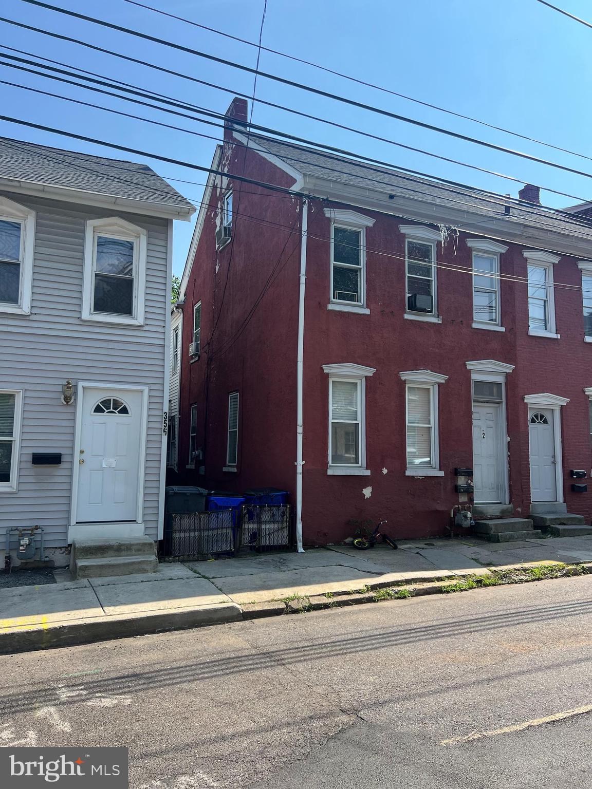 a front view of building with yard