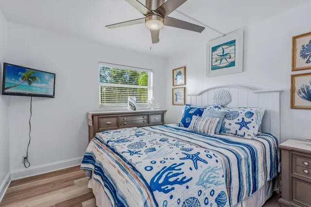 a kitchen with a sink cabinets and dining table