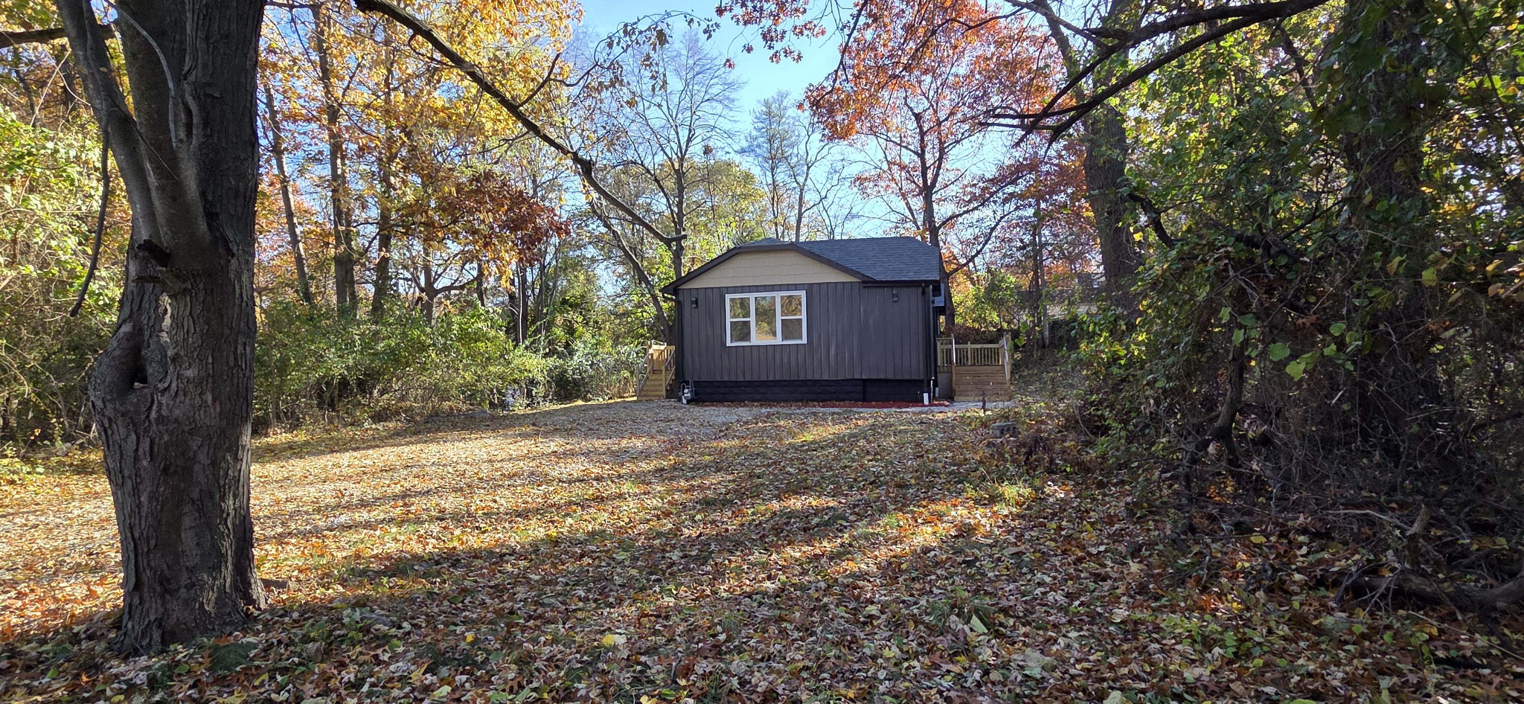 7325 Locust Avenue Gary, IN 46403 - Photo 119 of 136 a view of a house with a tree in the forest