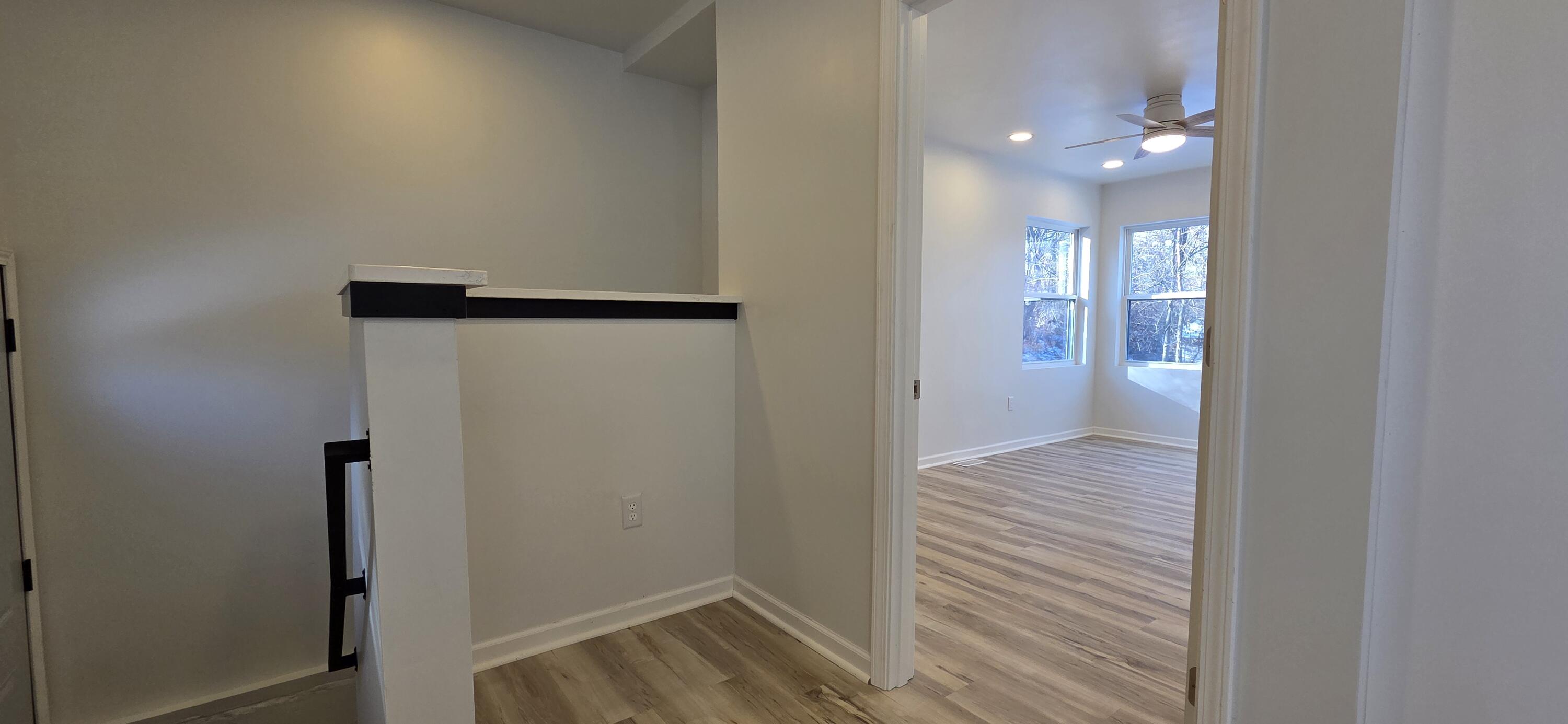 7325 Locust Avenue Gary, IN 46403 - Photo 29 of 136 a view of a hallway with wooden floor