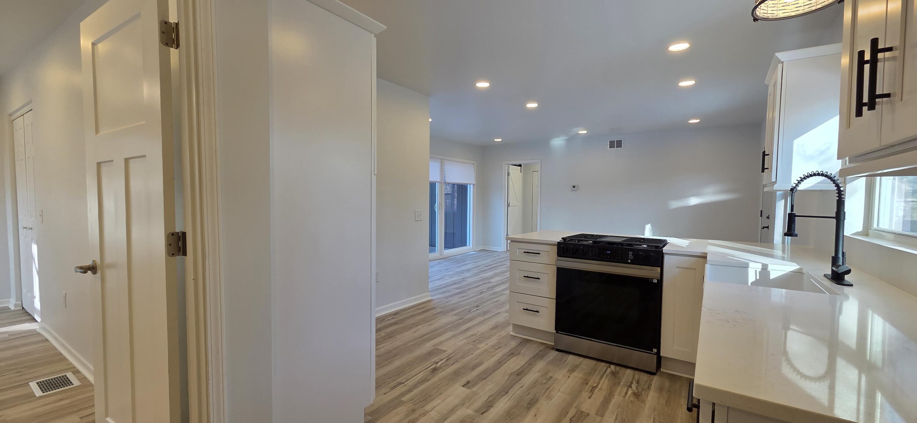 7325 Locust Avenue Gary, IN 46403 - Photo 37 of 136 a kitchen with a refrigerator and a stove top oven