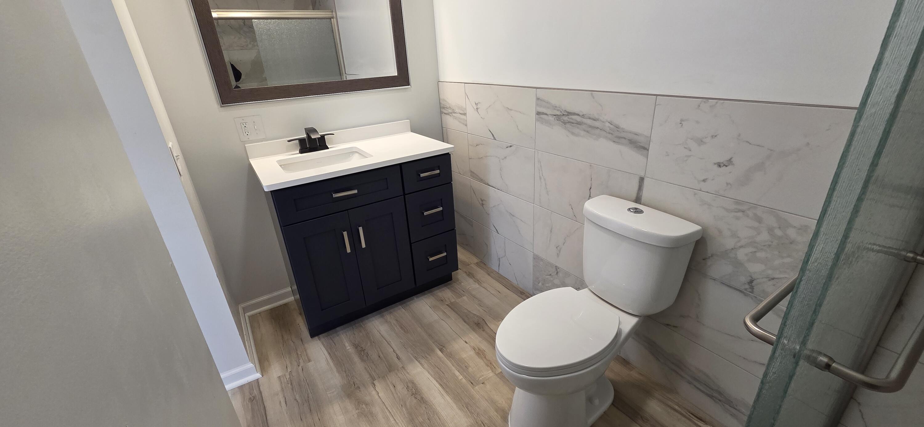 7325 Locust Avenue Gary, IN 46403 - Photo 70 of 136 a bathroom with a sink and a toilet