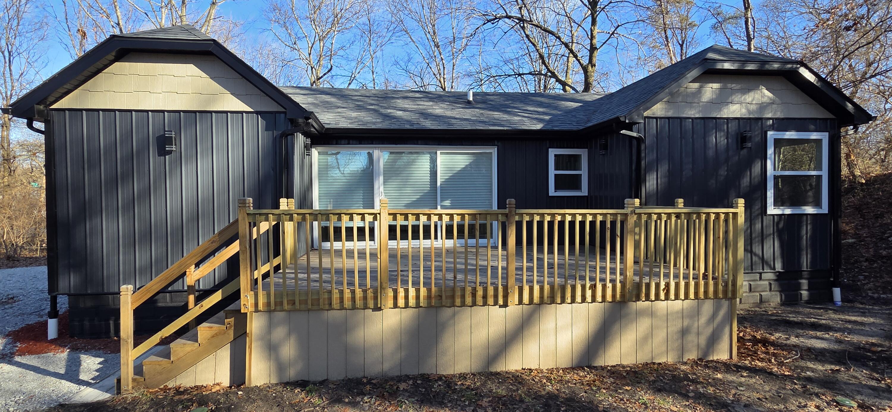 7325 Locust Avenue Gary, IN 46403 - Photo 7 of 136 a view of a house with a yard