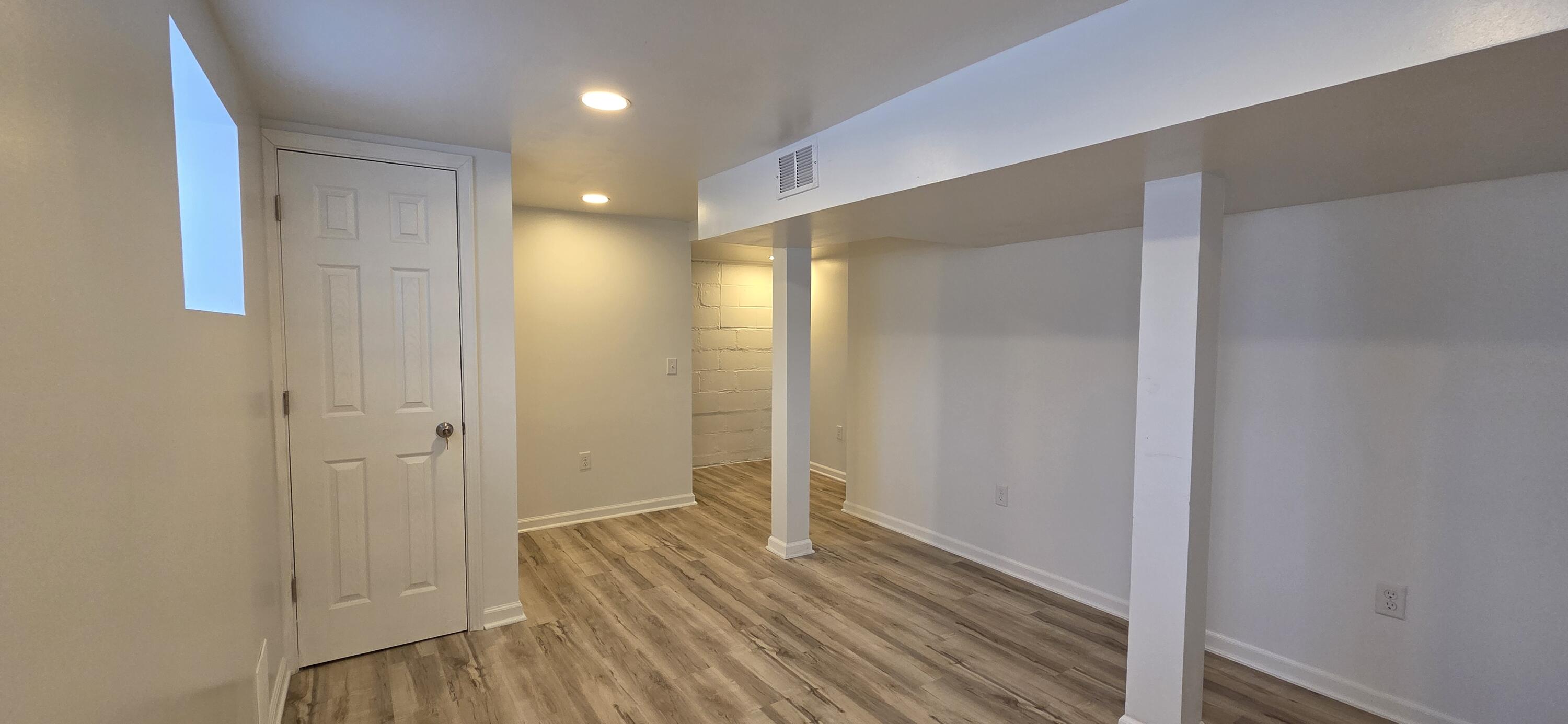 7325 Locust Avenue Gary, IN 46403 - Photo 82 of 136 a view of a hallway with wooden floor