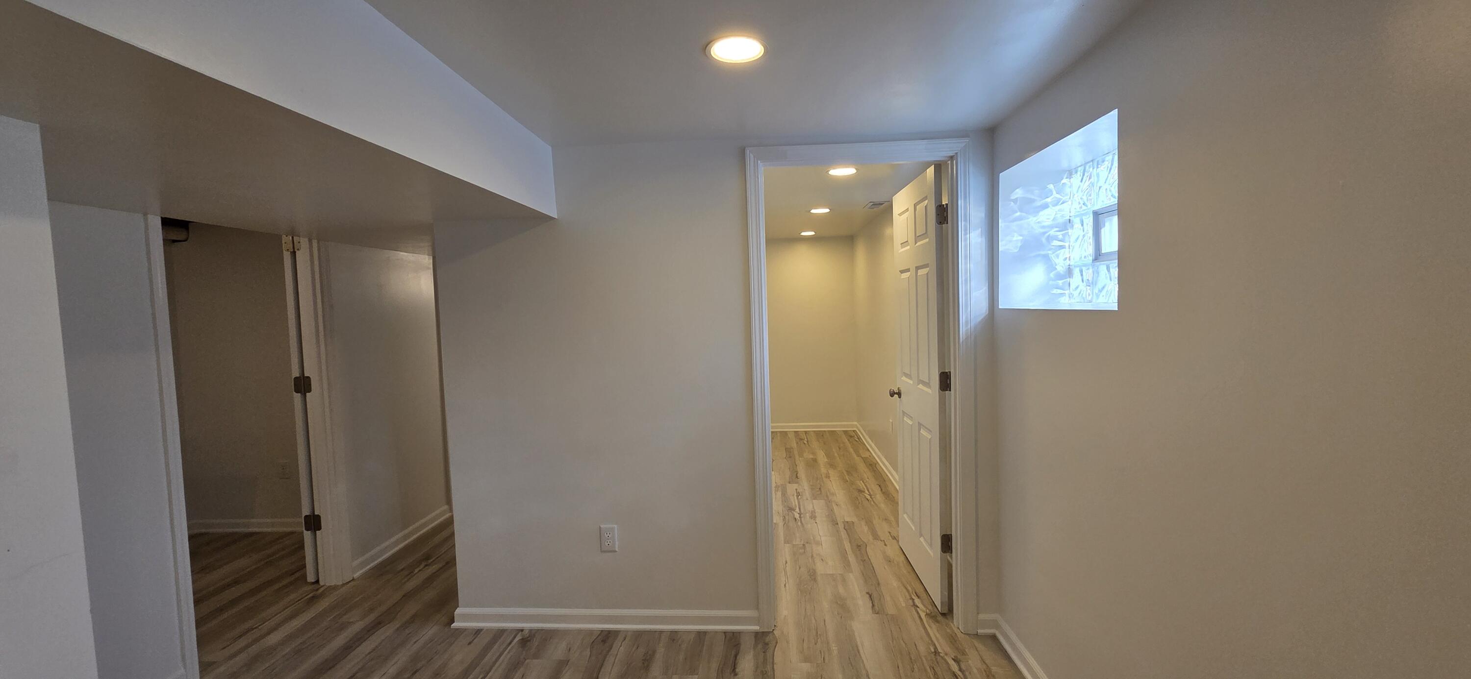 7325 Locust Avenue Gary, IN 46403 - Photo 83 of 136 a view of a hallway with wooden floor
