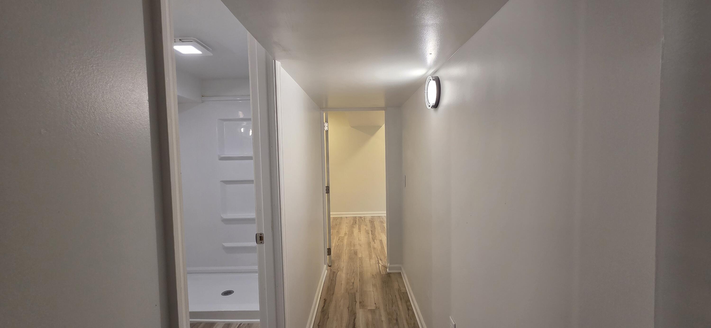 7325 Locust Avenue Gary, IN 46403 - Photo 93 of 136 a view of a hallway with wooden floor