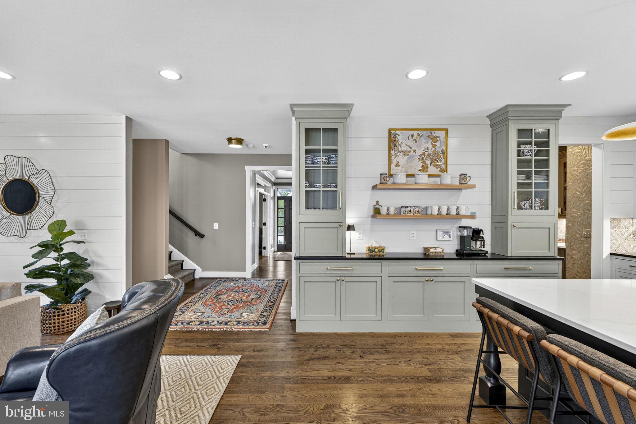 105 Reed Street Middleburg, VA 20117 - Photo 19 of 62 a large living room with stainless steel appliances granite countertop furniture and a potted plant
