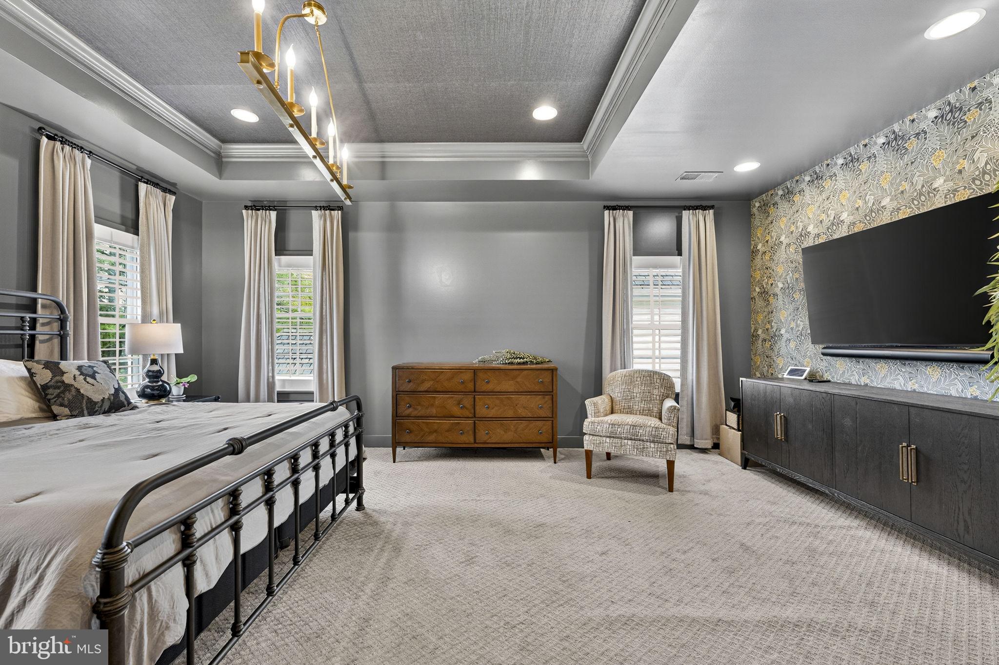 105 Reed Street Middleburg, VA 20117 - Photo 34 of 62 a bedroom with furniture and flat screen tv