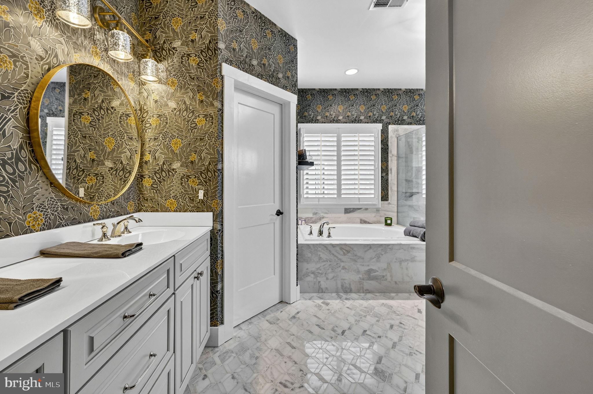 105 Reed Street Middleburg, VA 20117 - Photo 37 of 62 a bathroom with a granite countertop sink mirror and shower