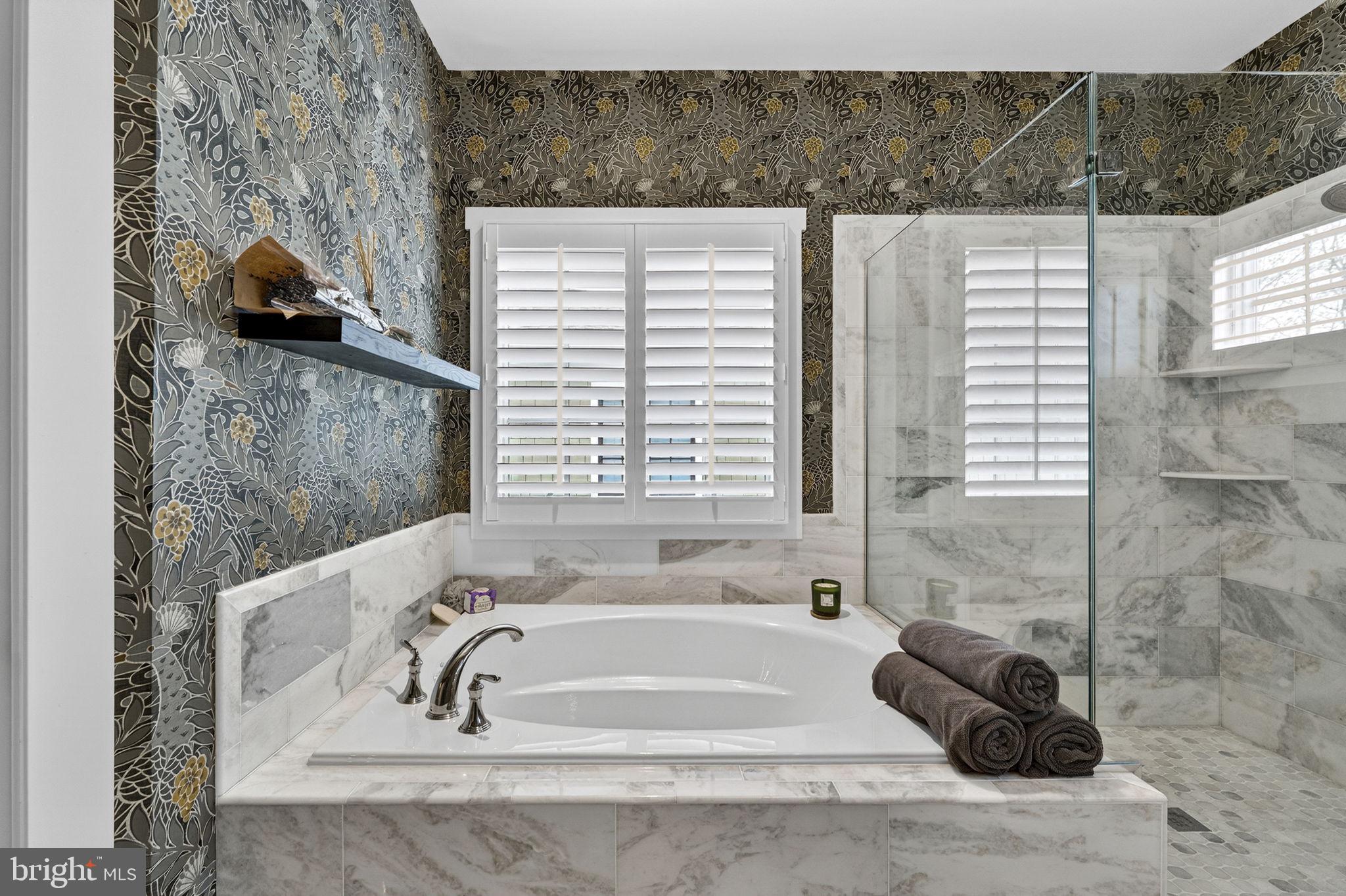 105 Reed Street Middleburg, VA 20117 - Photo 39 of 62 a bath tub sitting next to a window