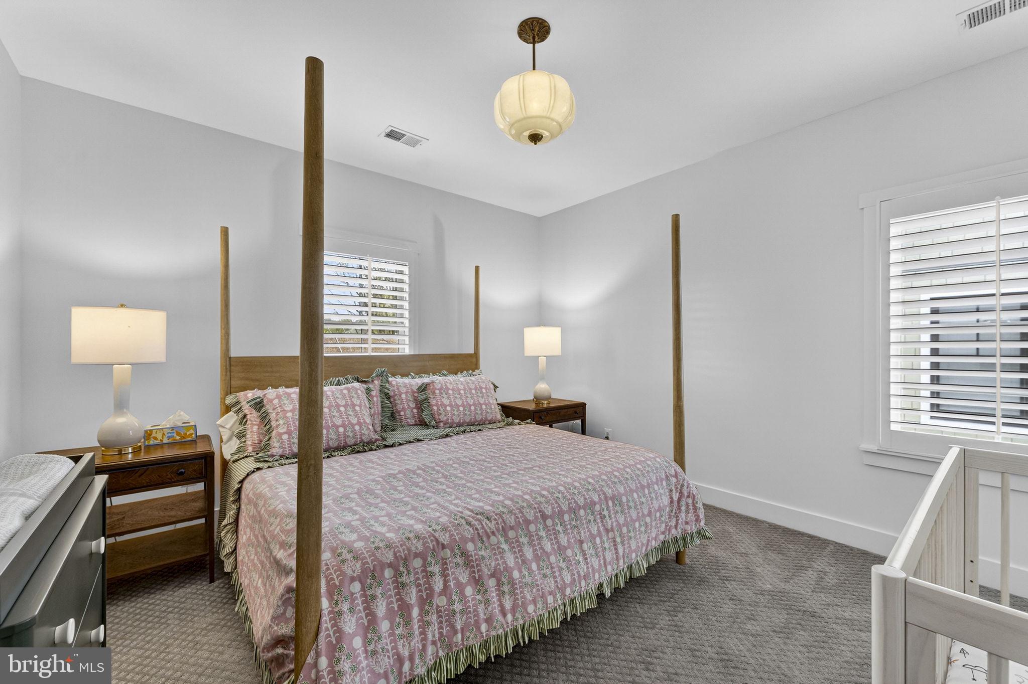 105 Reed Street Middleburg, VA 20117 - Photo 45 of 62 a bedroom with a bed and a window