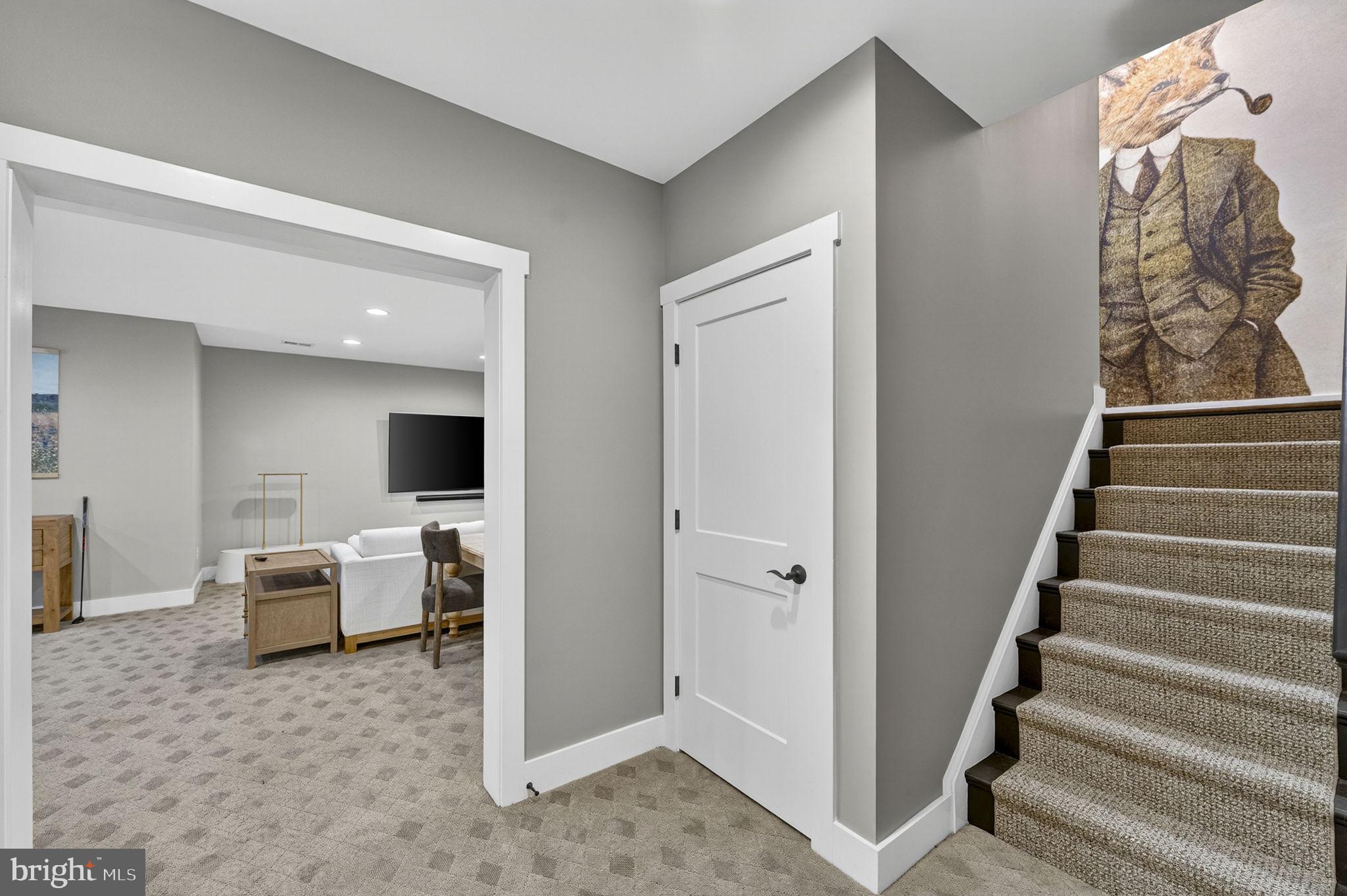 105 Reed Street Middleburg, VA 20117 - Photo 48 of 62 a view of a livingroom with wooden floor and a flat screen tv