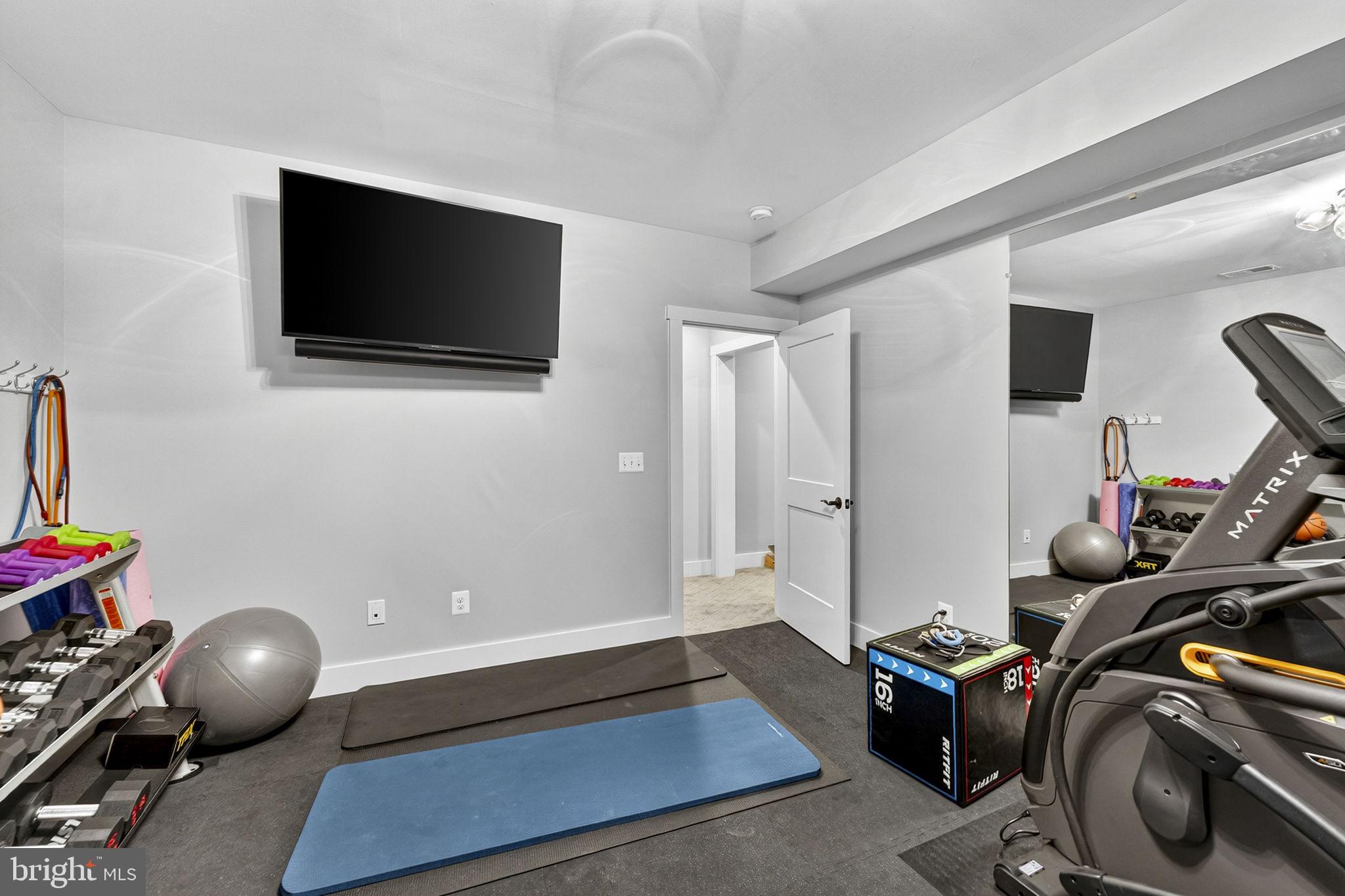 105 Reed Street Middleburg, VA 20117 - Photo 50 of 62 a view of a room with gym equipment