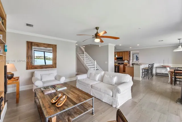 a large kitchen with granite countertop a large counter top and sink
