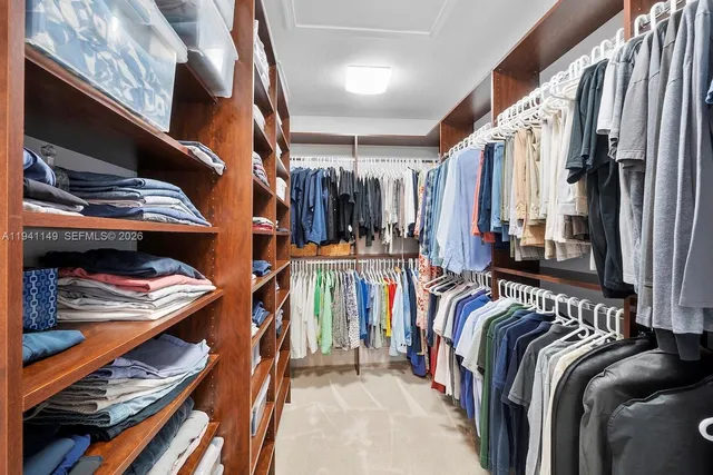 a view of a chair and table on the wooden floor