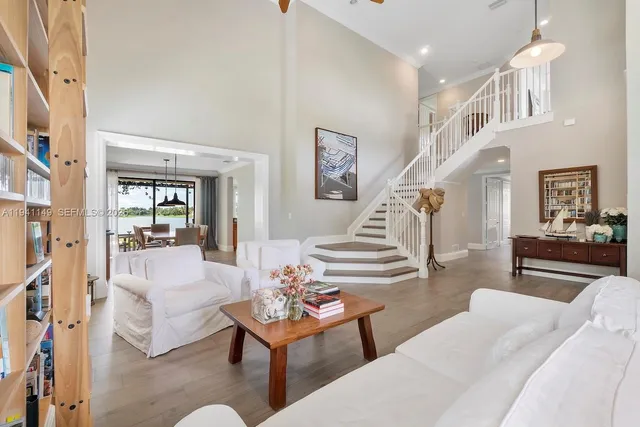 a view of a house with a yard and a garden