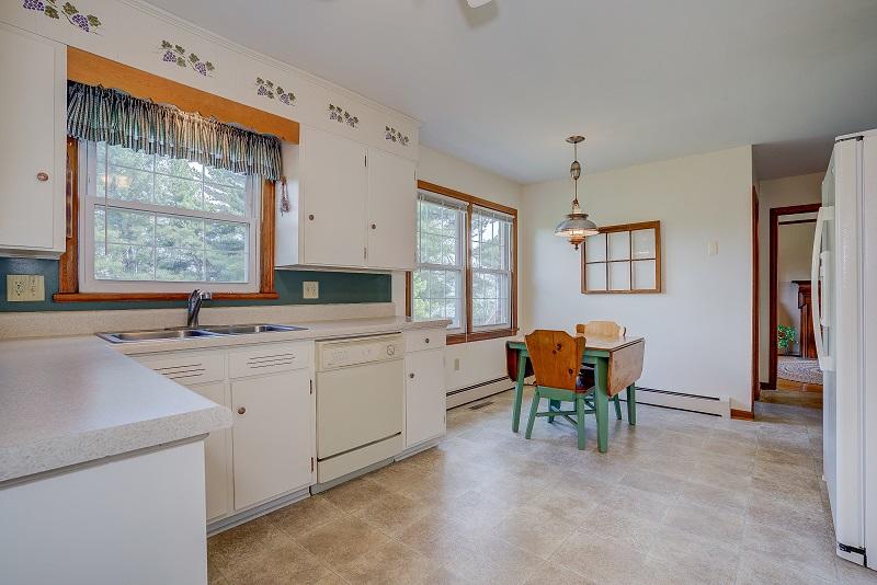 627 Olney Road Vinton, VA 24179 - Photo 14 of 43 a kitchen with stainless steel appliances granite countertop sink and window