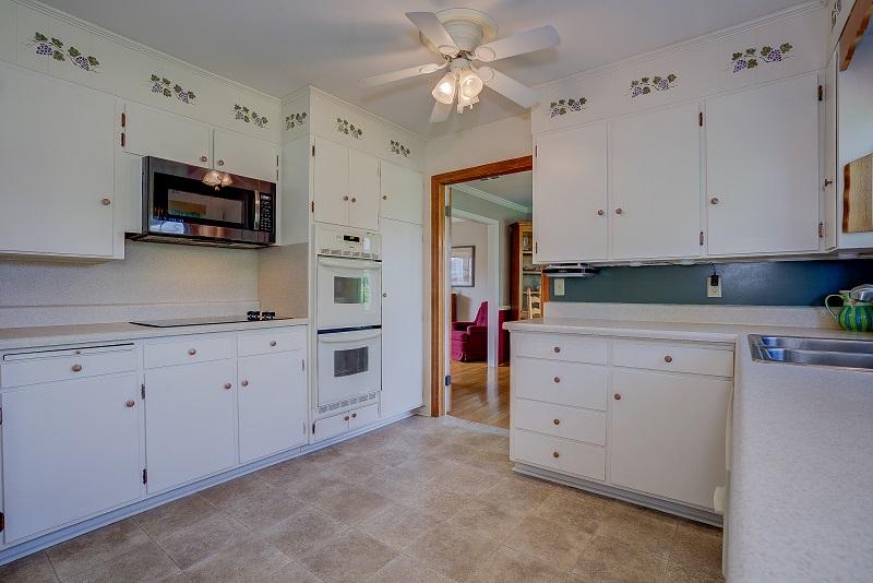 627 Olney Road Vinton, VA 24179 - Photo 17 of 43 a kitchen with cabinets stainless steel appliances and a counter space