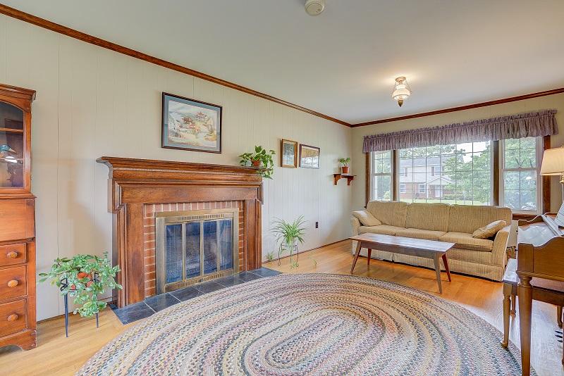 627 Olney Road Vinton, VA 24179 - Photo 21 of 43 a bedroom with furniture and a fireplace