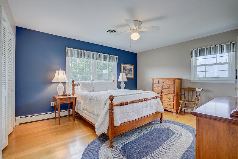 627 Olney Road Vinton, VA 24179 - Photo 26 of 43 a bedroom with a bed and wooden floor