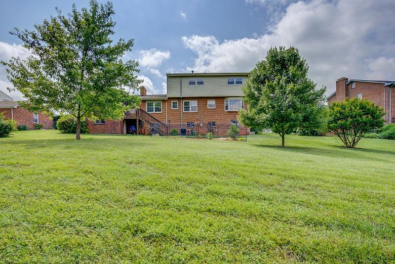 627 Olney Road Vinton, VA 24179 - Photo 38 of 43 a view of a big house with a big yard and large trees
