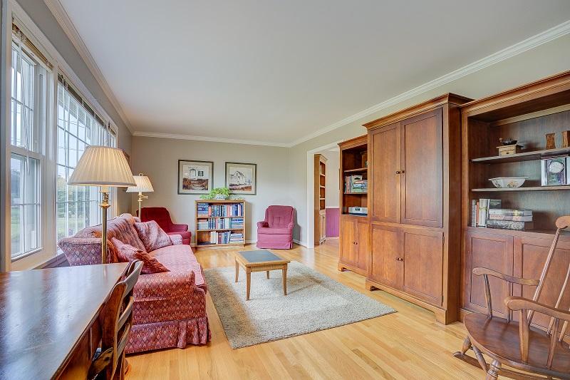 627 Olney Road Vinton, VA 24179 - Photo 7 of 43 a living room with furniture a rug and a table