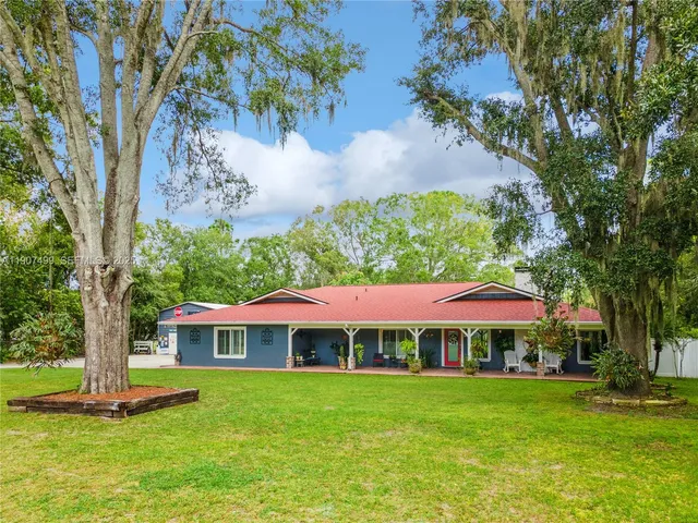 a view of a house with a garden