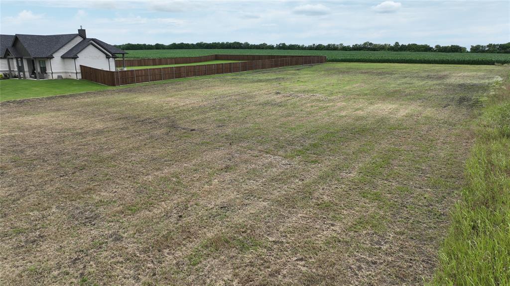 259 Schneider Road Sherman, TX 75090 - Photo 1 of 1 View of green lawn with a rural view