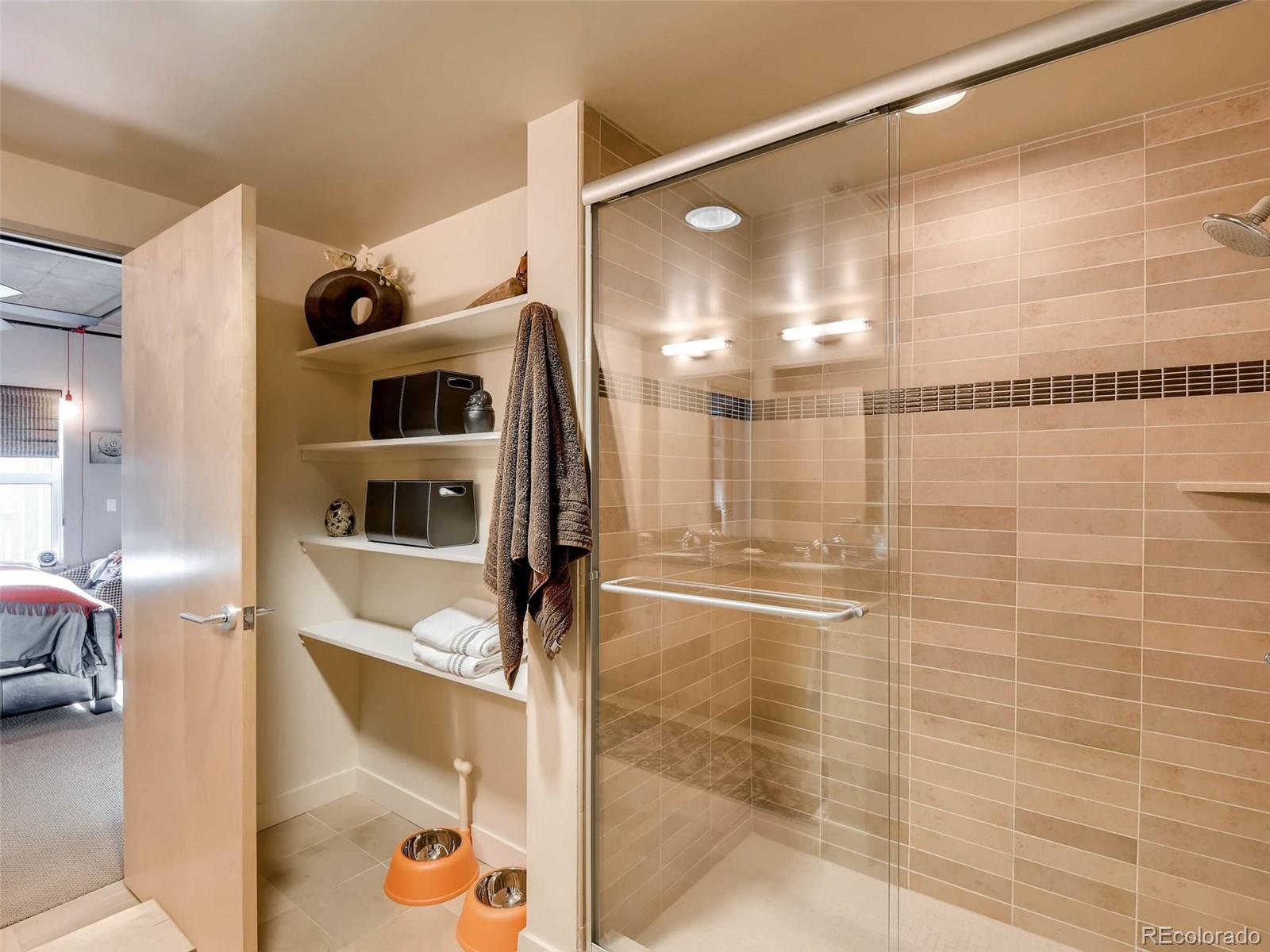 2229 Blake Street, Unit 506 Denver, CO 80205 - Photo 22 of 29 a bathroom with a shower