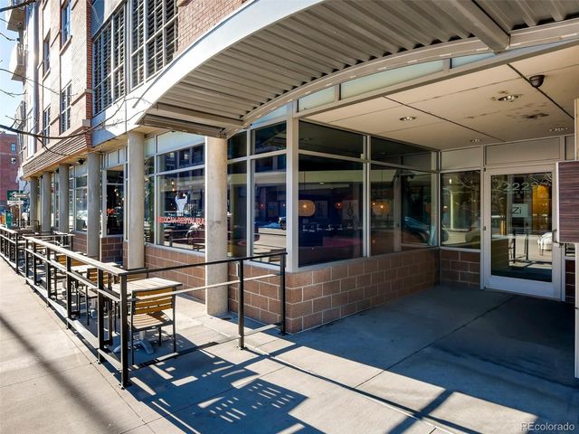 a view of a balcony with chairs