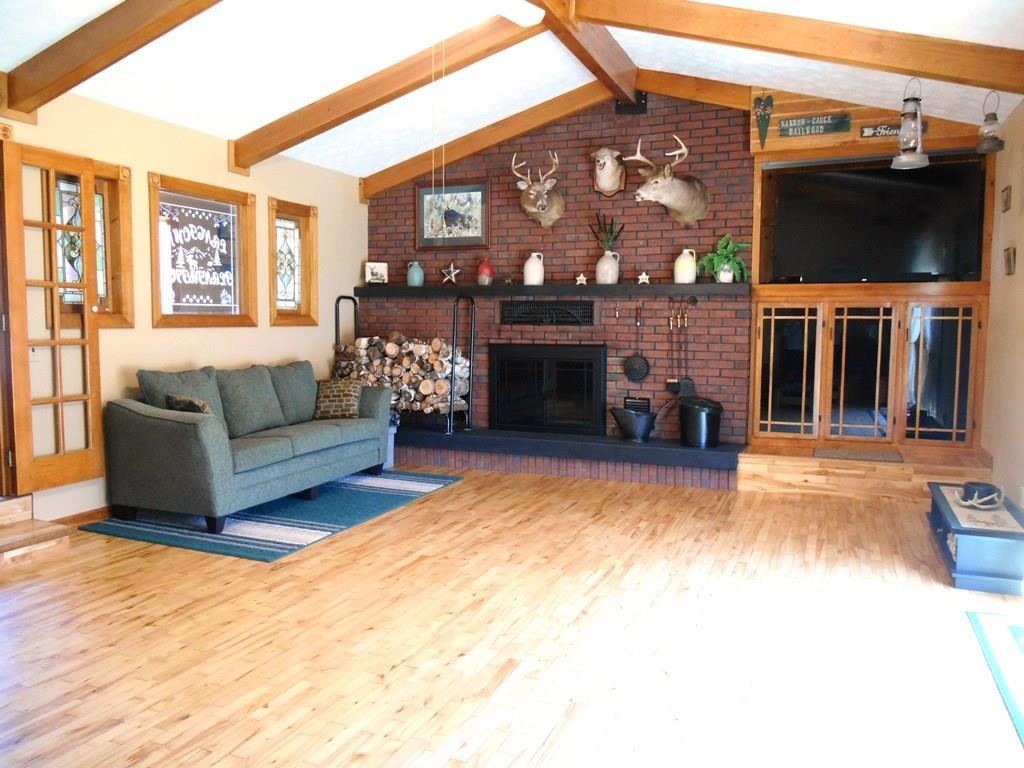 1356 Stratton Road Rangeley, ME 04970 - Photo 4 of 35 Large sunlit step-down family room...