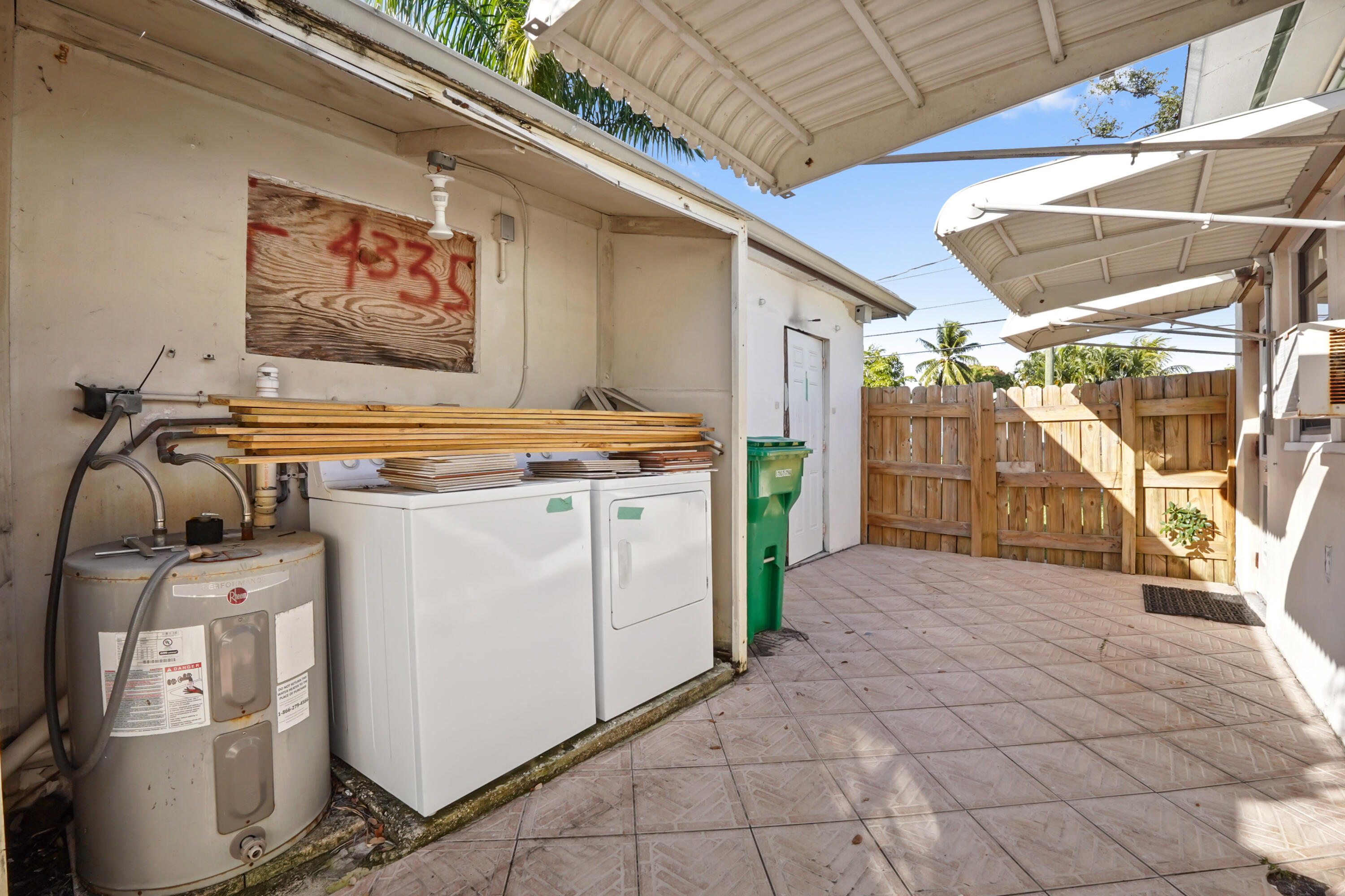 3858 Lakewood Road Palm Springs, FL 33461 - Photo 18 of 39 a utility room with dryer and washer