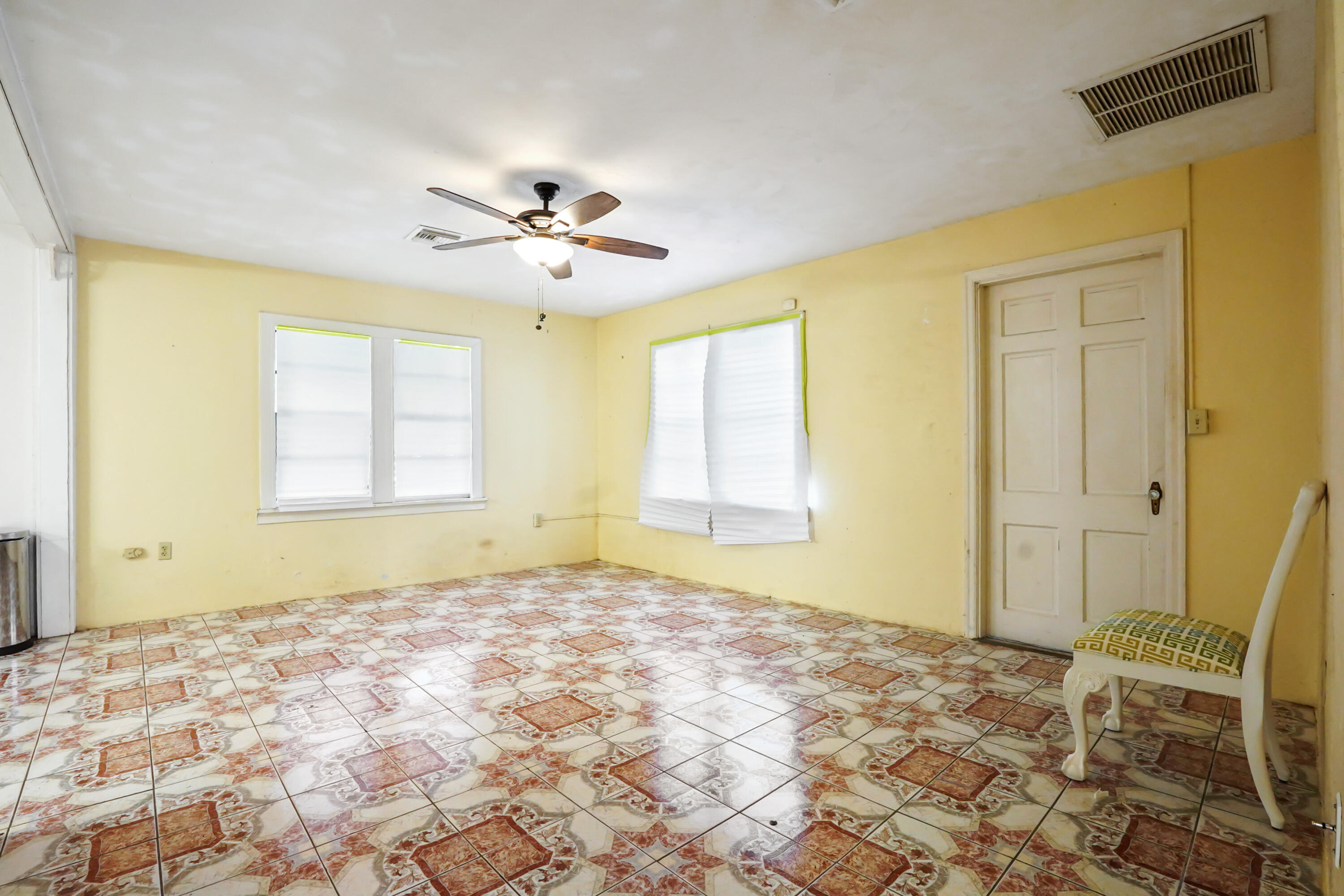 3858 Lakewood Road Palm Springs, FL 33461 - Photo 8 of 39 a view of a bedroom with a natural light