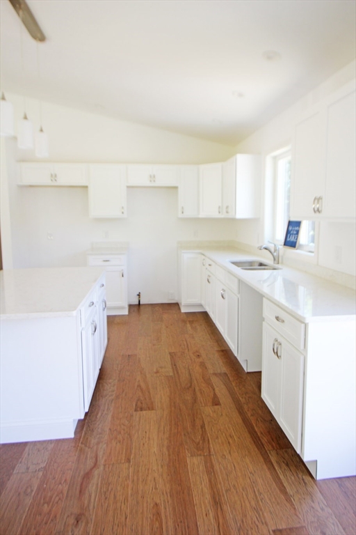 12 Pine Road Williamsburg, MA 01096 - Photo 5 of 24 a kitchen with a sink a window and cabinets