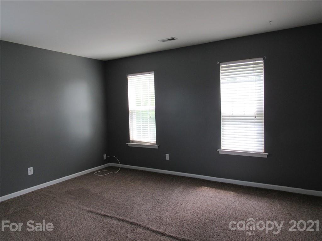 116 Royalton Road Mooresville, NC 28115 - Photo 12 of 12 an empty room with a window