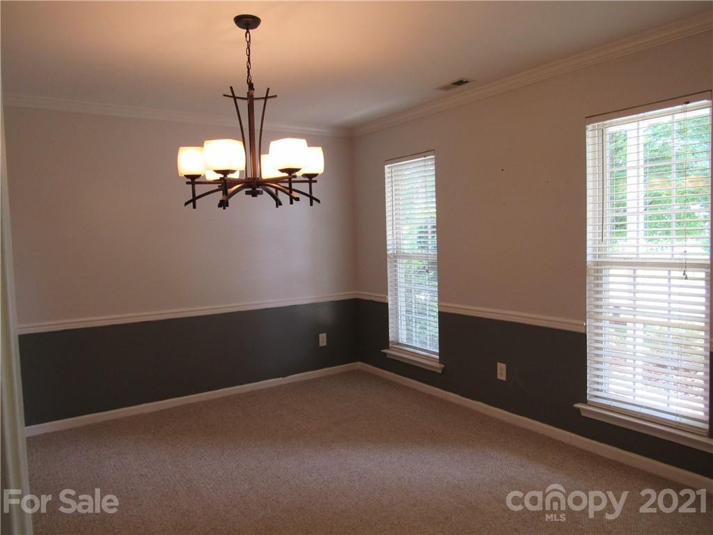 116 Royalton Road Mooresville, NC 28115 - Photo 3 of 12 a view of an empty room with a window