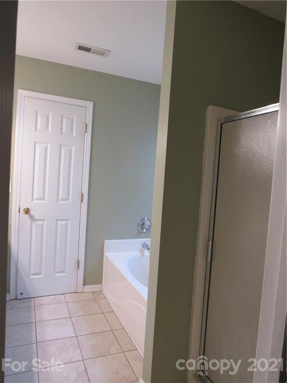 116 Royalton Road Mooresville, NC 28115 - Photo 8 of 12 a bathroom with a sink and a mirror