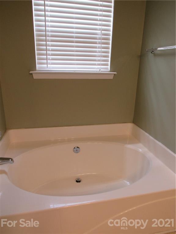 116 Royalton Road Mooresville, NC 28115 - Photo 9 of 12 a bathroom with a bathtub