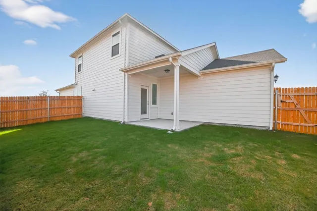 a view of a backyard with a garden