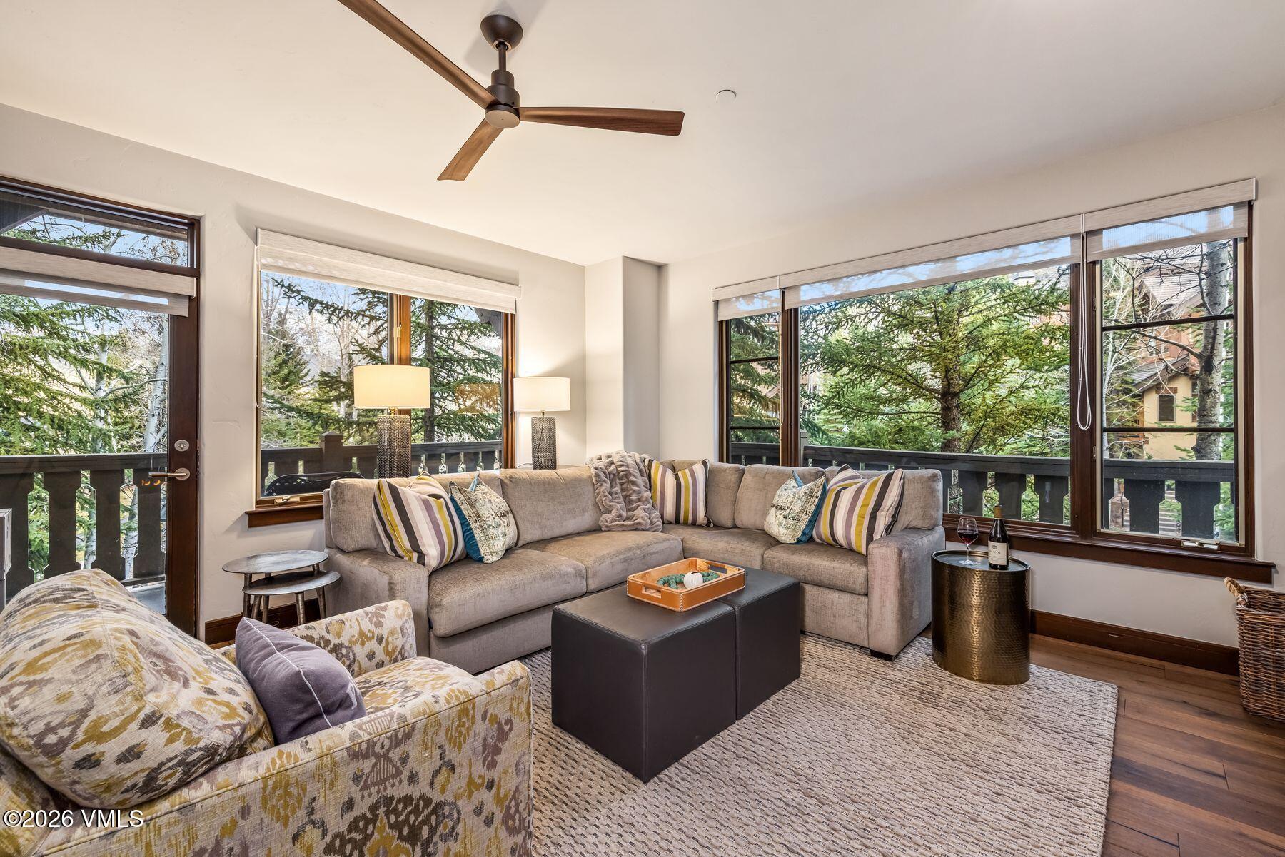 30 Cresta Road, Unit 202 Edwards, CO 81632 - Photo 1 of 23 a living room with furniture and a large window