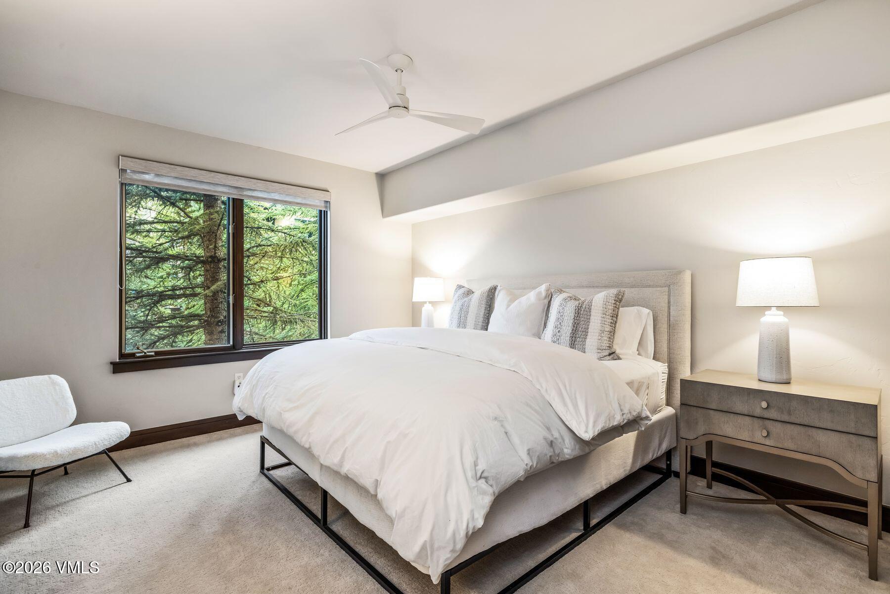 30 Cresta Road, Unit 202 Edwards, CO 81632 - Photo 11 of 23 a bedroom with a bed and a couch